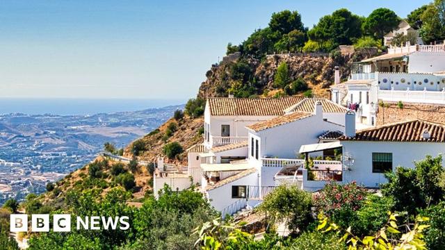 A scenic view of homes on a hilltop in Spain's Costa del Sol