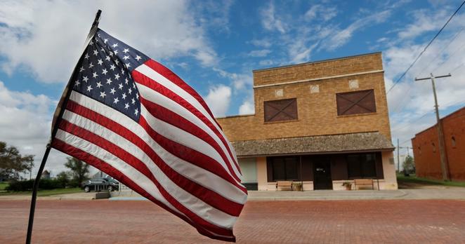 An American flag flies in front of Ralls Family Medicine in Ralls on Sept. 1, 2022.