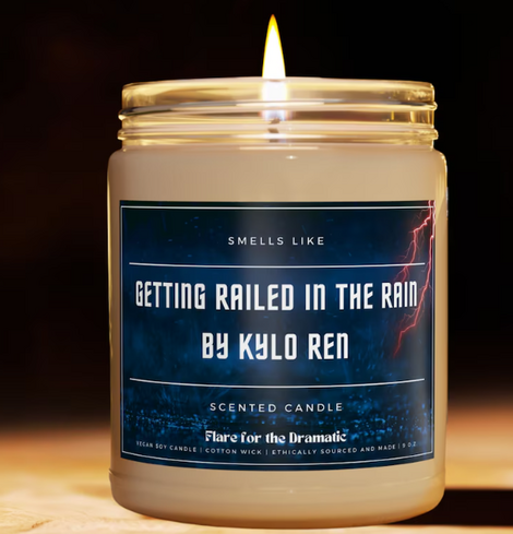 candle whose label reads 'Getting railed in the rain by Kylo Ren'
